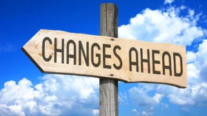 Wooden sign reading “Changes Ahead” to illustrate the shift sparked by Burnett vs. NAR