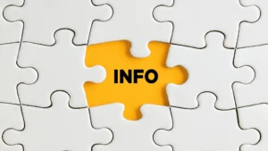 Puzzle pieces with a missing center labeled “Info” to show buyers needing clarity on new commission rules