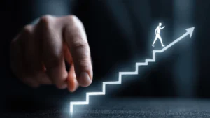 Hand revealing a glowing ladder with a man walking upward, symbolizing expert guidance and forward steps