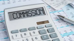 Calculator displaying the word “Commission,” symbolizing North Atlanta buyer agent commissions and changing costs