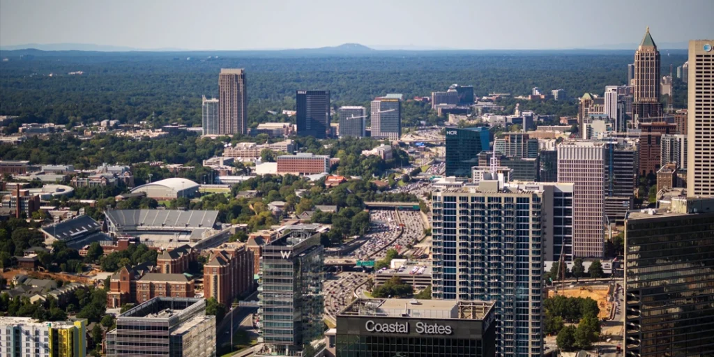A bird’s eye view of North Atlanta city skyline showcasing vibrant neighborhoods and modern real estate
