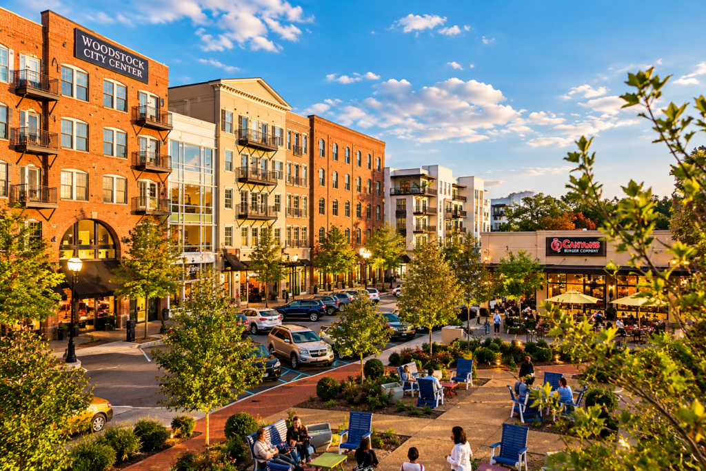 Downtown Woodstock, GA with buildings and trees and people